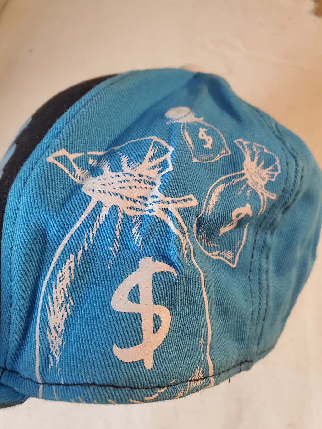 Brisco Brands Blue Snapback HUSTLE Cap with Money Bag Graphics